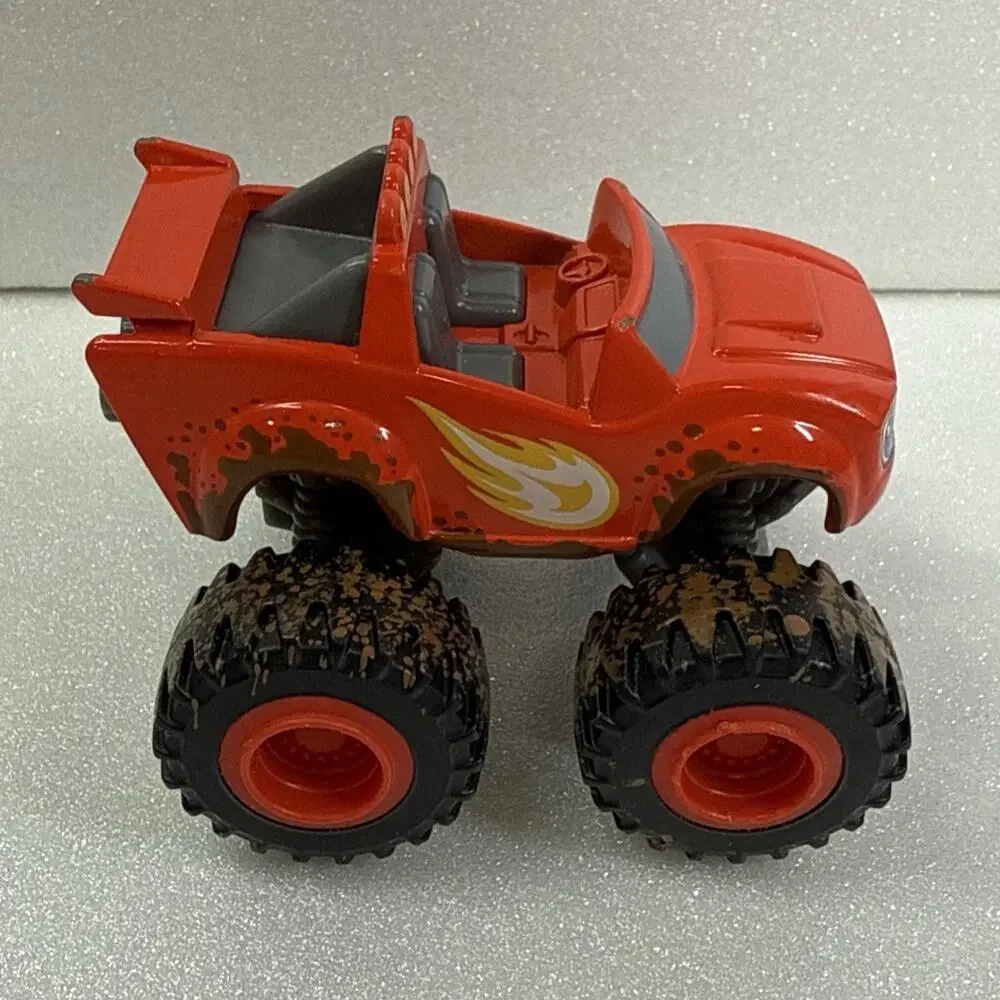 Blaze & The Monster Machines Mud Racin' Blaze Muddy Tires Die Cast Truck Red